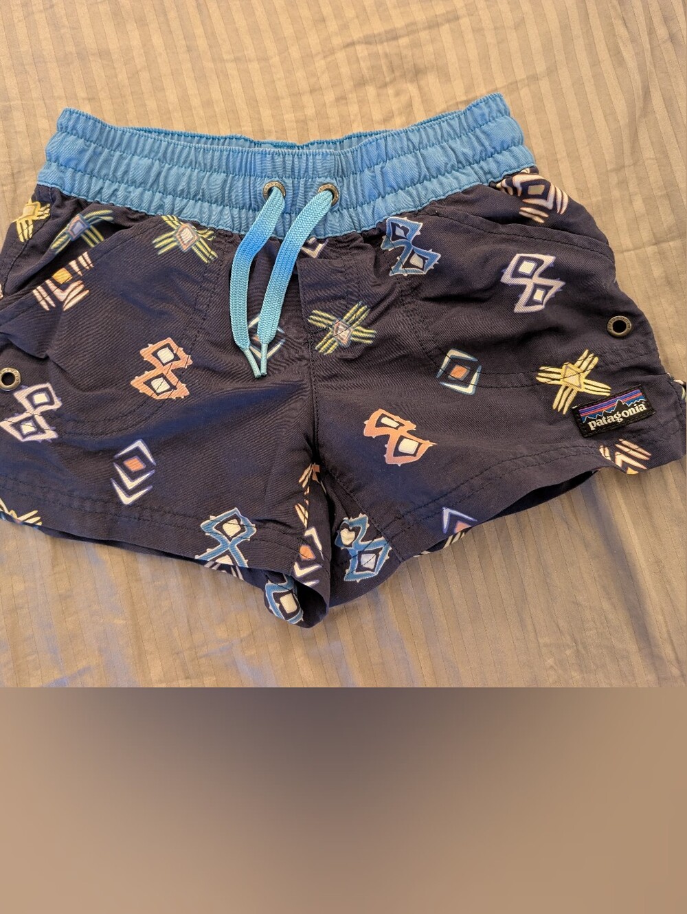 Patagonia Navy Swim Shorts with Light Blue Waistband and Geometric Print